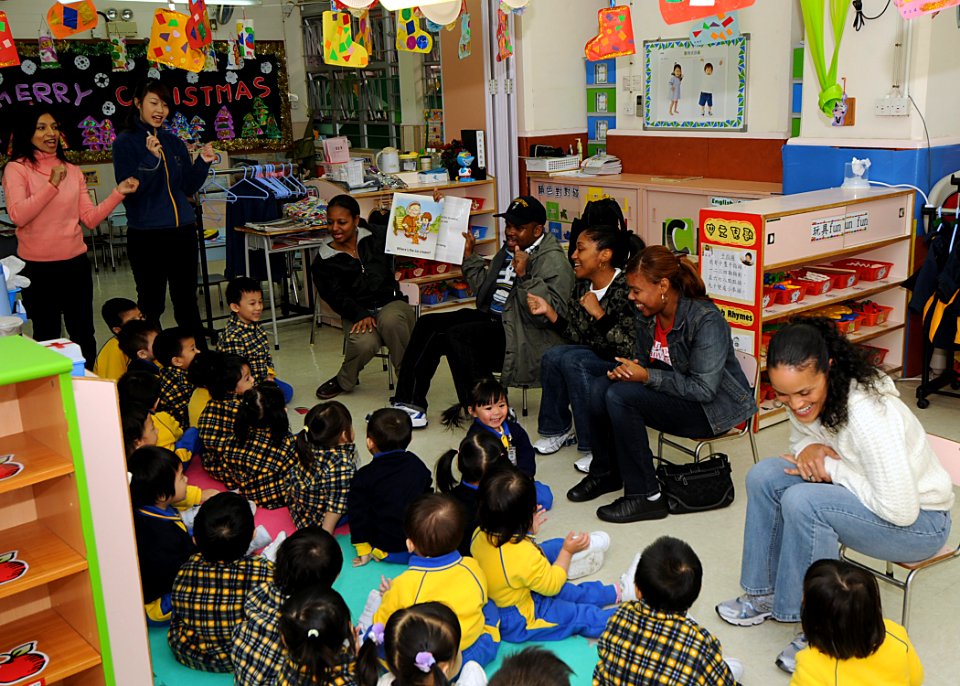 US Navy 081128-N-3262C-060 The amphibious command ship USS Blue Ridge (LCC 19) chief petty officers read to students from the Hong Kong Society for the Protection of Children during a community relations project