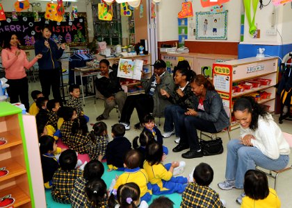 US Navy 081128-N-3262C-060 The amphibious command ship USS Blue Ridge (LCC 19) chief petty officers read to students from the Hong Kong Society for the Protection of Children during a community relations project