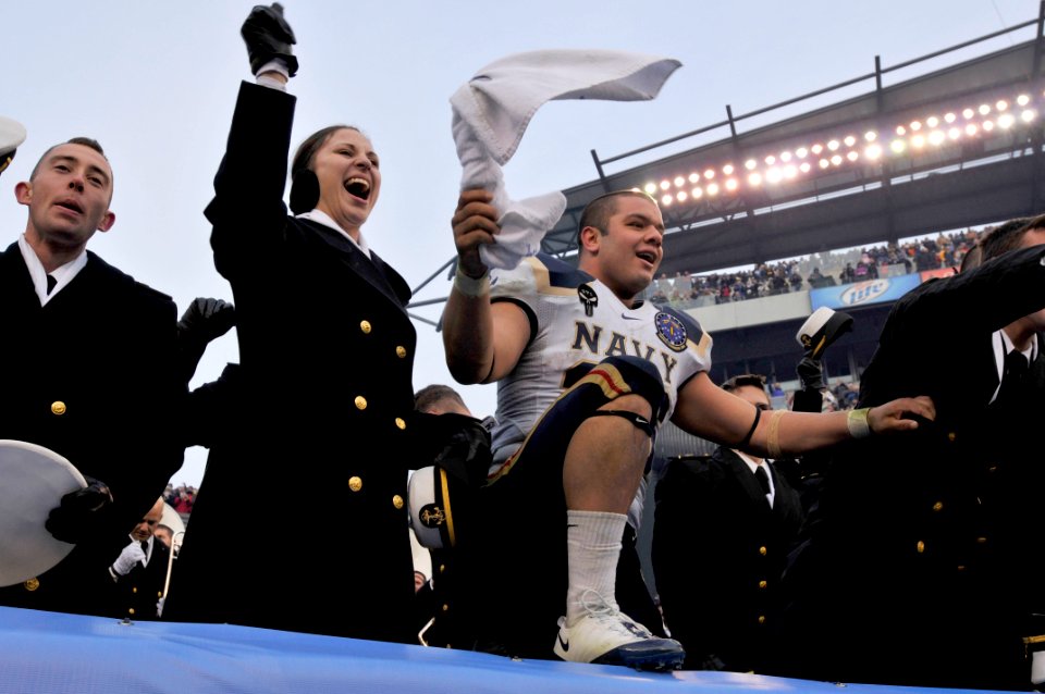 US Navy 081206-N-4565G-364 U.S. Naval Academy midshipmen celebrate after beating the U.S. Military Academy Black Knights 34 to 0 in the 109th Army-Navy college football game at Lincoln Financial Field in Philadelphia