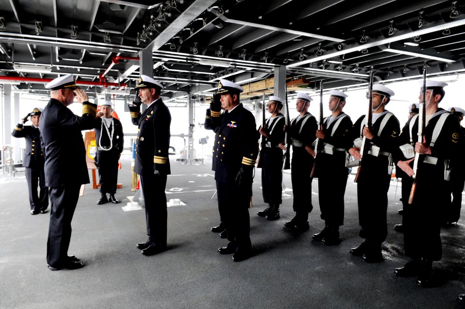 US Navy 081201-N-8273J-120 Chief of Naval Operations (CNO) Adm. Gary Roughead salutes during an honors ceremony aboard the Off-shore Port Vessel (OPV) PZM-81