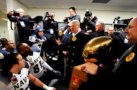 US Navy 081206-N-8273J-458 hief of Naval Operations (CNO) Adm. Gary Roughead, center, and Secretary of the Navy (SECNAV) the Honorable Donald C. Winter, far right, congratulate the U.S. Naval Academy Midshipmen on their 34-0 vi
