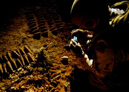 US Navy 081205-N-6278K-346 Explosive Ordnance Technician 1st Class Ben Jones, assigned to Explosive Ordnance Disposal Mobile Unit (EODMU) 1