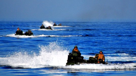 US Navy 081206-N-4774B-562 Amphibious assault vehicles move toward the amphibious transport dock ship USS New Orleans (LPD 18)