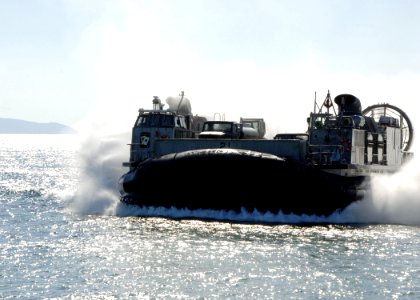 US Navy 081201-N-8816D-047 Landing Craft Air Cushion (LCAC) 21, approaches a U.S. bombing range off the coast of Okinawa to deliver Seabees and heavy equipment from Naval Mobile Construction Battalion (NMCB) 133