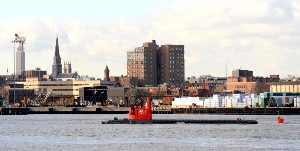 US Navy 081202-N-8467N-004 Submarine NR-1 makes its way the Thames River past New London for the final time photo