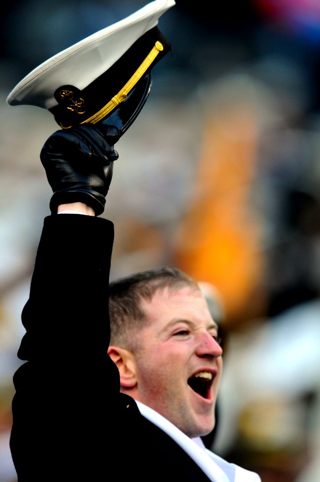 US Navy 081206-N-5345W-669 A U.S. Naval Academy midshipman cheers the U.S. Naval Academy Midshipmen during the 109th Army-Navy college football game at Lincoln Financial Field in Philadelphia