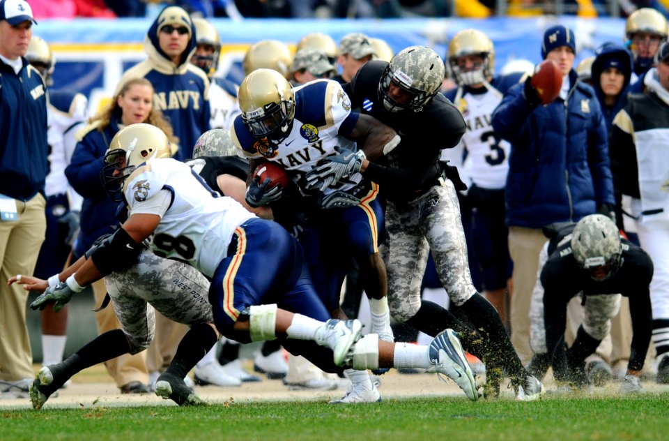 US Navy 081206-N-5345W-807 U.S. Naval Academy slot back Shun White (^26) runs for a first down in the first half of the 109th Army-Navy college football game at Lincoln Financial Field in Philadelphia