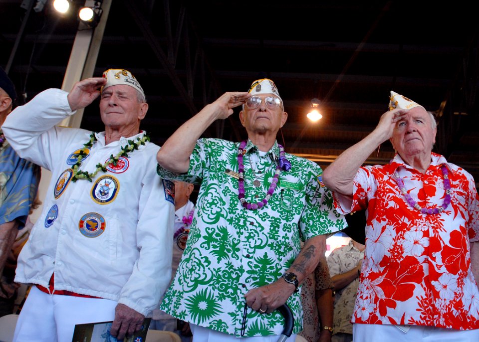 US Navy 081207-N-5476H-054 Pearl Harbor survivors render a hand salute for the playing of the national anthem during a joint U.S. Navy-National Park Service ceremony commemorating the 67th anniversary of the attack on Pearl Har
