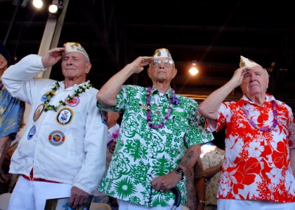 US Navy 081207-N-5476H-054 Pearl Harbor survivors render a hand salute for the playing of the national anthem during a joint U.S. Navy-National Park Service ceremony commemorating the 67th anniversary of the attack on Pearl Har