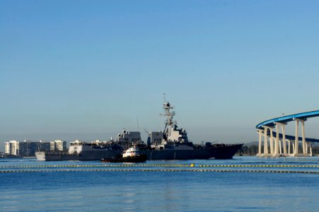 US Navy 110204-N-ZC343-441 SAN DIEGO (Feb. 4, 2011) The guided-missile destroyer USS Kidd (DDG 100) approaches the Coronado Bridge as the ship dep