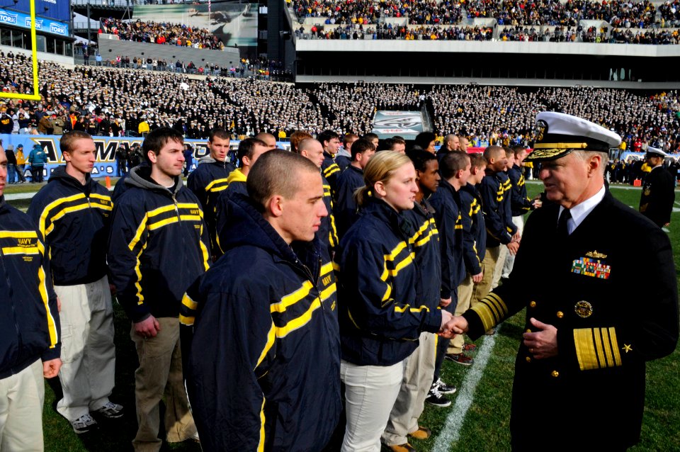 US Navy 081206-N-8273J-253 Chief of Naval Operations Adm. Gary Roughead congratulates new Navy recruits who enlisted during the 109th annual Army-Navy football game