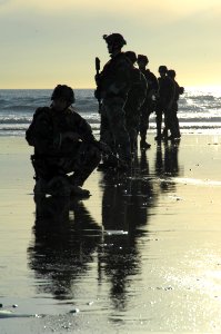 US Navy 081210-N-5366K-048 Special Warfare Combatant-craft Crewmen prepare to patrol the beach during a casualty assistance and evacuation scenario