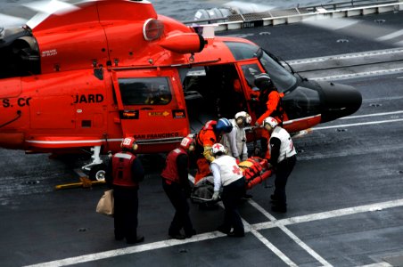 US Navy 081214-N-7981E-144 An injured merchant Sailor from the Liberian cargo ship