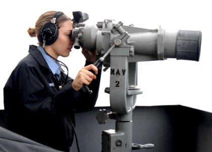 US Navy 081217-N-9900B-016 Boatswain's Mate Seaman Jacqueline Twigg stands port lookout watch