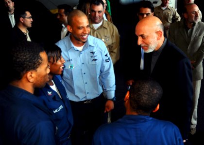 US Navy 081211-N-7571S-010 Afghanistan President Hamid Karzai addresses Sailors in the hangar bay of the Nimitz-class aircraft carrier USS Theodore Roosevelt (CVN 71)