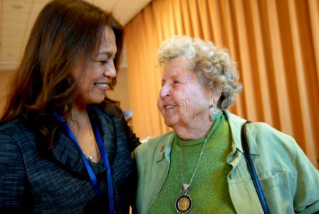 US Navy 081212-N-9818V-479 Diana Campa, wife of Master Chief Petty Officer of the Navy (MCPON) Joe R. Campa, Jr., speaks with Ima Black, widow of the Navy's first MCPON, after a Passing of the Cutlass and retirement ceremony at