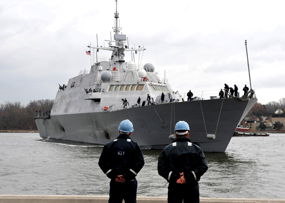 US Navy 081210-N-5390M-025 Boatswain's Mate 3rd Class Jacob Beard and Gunner's Mate 3rd Class Andrew Naff await the arrival of USS Freedom (LCS 1)