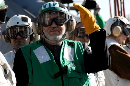 US Navy 081211-N-8822R-124 Afghanistan president Hamid Karzai observes flight operations on the flight deck of the Nimitz-class aircraft carrier USS Theodore Roosevelt (CVN 71)