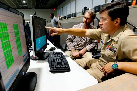 US Navy 110315-N-HW977-160 Capt. Jay Kadowaki, right, commanding officer of Naval Surface Warfare Center (NSWC), Corona Division, and Flight Analy photo