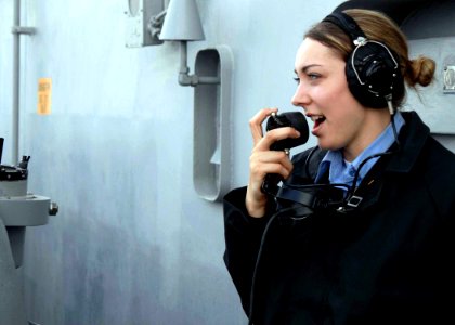 US Navy 081217-N-9900B-017 Boatswain's Mate Seaman Jacqueline Twigg stands port lookout watch