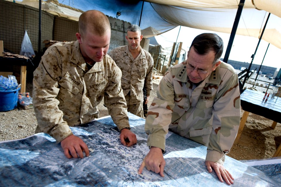 US Navy 081221-N-0696M-284 Adm. Mike Mullen is briefed by 2nd Lt. Kenneth McKenzie, left, and Lt. Col. David Odom at Forward Operating Base Bakwah