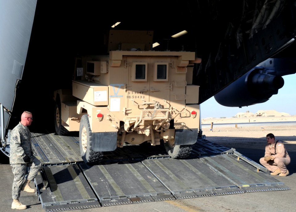 US Navy 090104-N-1120L-035 Air Force airmen load a Navy Seabee mine resistant, ambush protected vehicle into an Air Force C-17 for transportation