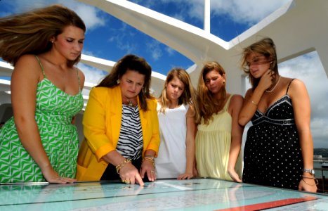 US Navy 081223-N-0879R-026 Mary Kidd-Plumer, second from left, and her four daughters visit the Battleship Arizona Memorial in Pearl Harbor
