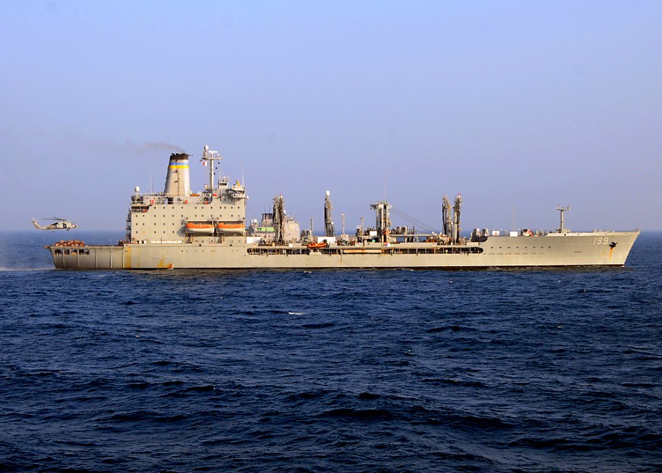 US Navy 081227-N-1082Z-002 An SH-60B Sea Hawk conducts a vertical replenishment with Military Sealift Command fleet replenishment oiler USNS Tippecanoe (T-AO 199)