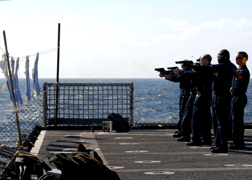 US Navy 081217-N-9134V-113 Sailors conduct weapons qualification training aboard the amphibious dock landing ship USS Carter Hall (LSD 50)