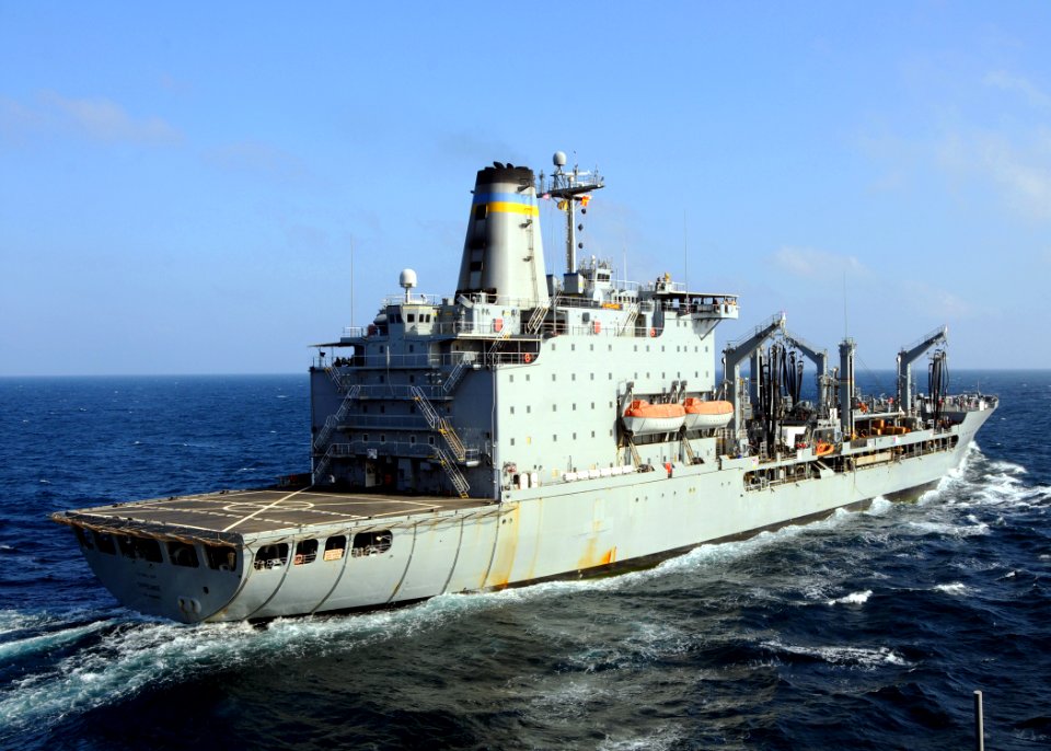 US Navy 081229-N-1082Z-003 USNS Tippecanoe (T-AO 199) pulls alongside the guided-missile cruiser USS Vella Gulf (CG 72) for a replenishment at sea