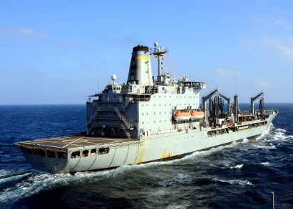 US Navy 081229-N-1082Z-003 USNS Tippecanoe (T-AO 199) pulls alongside the guided-missile cruiser USS Vella Gulf (CG 72) for a replenishment at sea