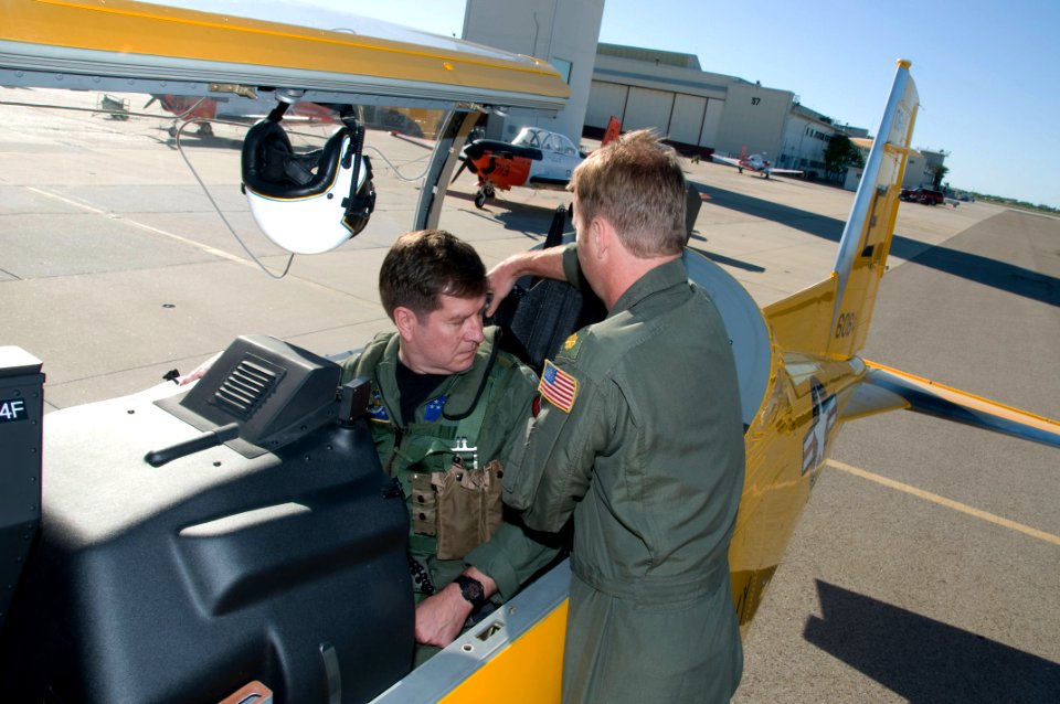 US Navy 110412-N-LY958-161 Vice Adm. Allen G. Myers prepares for a flight in a T-6 Texan