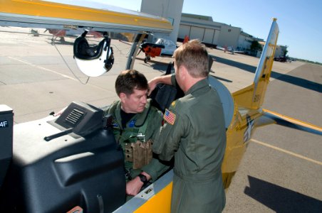 US Navy 110412-N-LY958-161 Vice Adm. Allen G. Myers prepares for a flight in a T-6 Texan