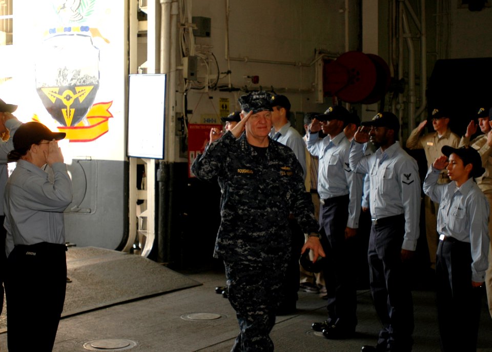 US Navy 081219-N-4236E-011 Chief of Naval Operations (CNO) Adm. Gary Roughead walks through side boys during his visit to USS Iwo Jima (LHD 7)