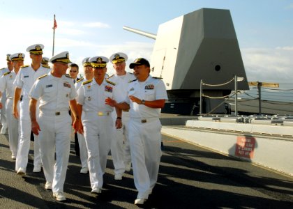US Navy 090109-N-5476H-096 Cmdr. Heedong Choi, right, commanding officer of the guided-missile destroyer USS Chafee (DDG 90), explains various shipboard operations to Republic of Korea Navy Chief of Naval Operations Adm. Jung O