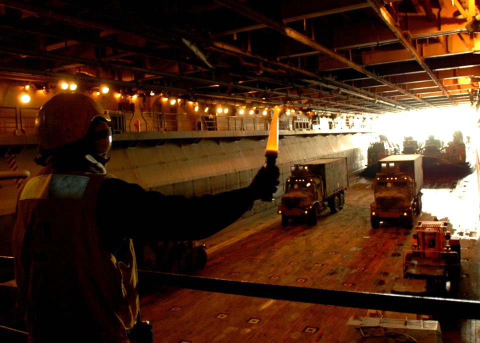 US Navy 081228-N-4236E-074 Boatswain's Mate Seaman Cornelius Gibbs directs a landing craft air cushion