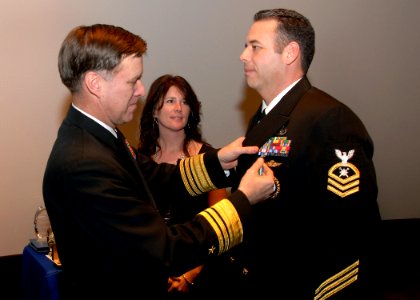 US Navy 090107-N-7948R-065 Vice Adm. Mark E. Ferguson, III presents the Navy-Marine Corps Commendation Medal to Chief Explosive Ordnance Disposal Kevin Parra