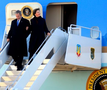 US Navy 090110-N-5345W-059 President George W. Bush and his wife, first lady Laura Bush, disembark from Air Force One