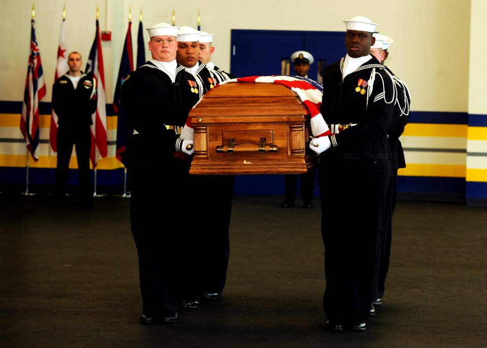 US Navy 090108-N-7948R-003 Sailors assigned to the U.S. Navy Ceremonial Guard headquarters conduct a casket carrying demonstration