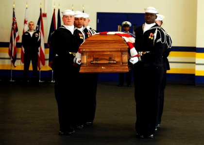 US Navy 090108-N-7948R-003 Sailors assigned to the U.S. Navy Ceremonial Guard headquarters conduct a casket carrying demonstration
