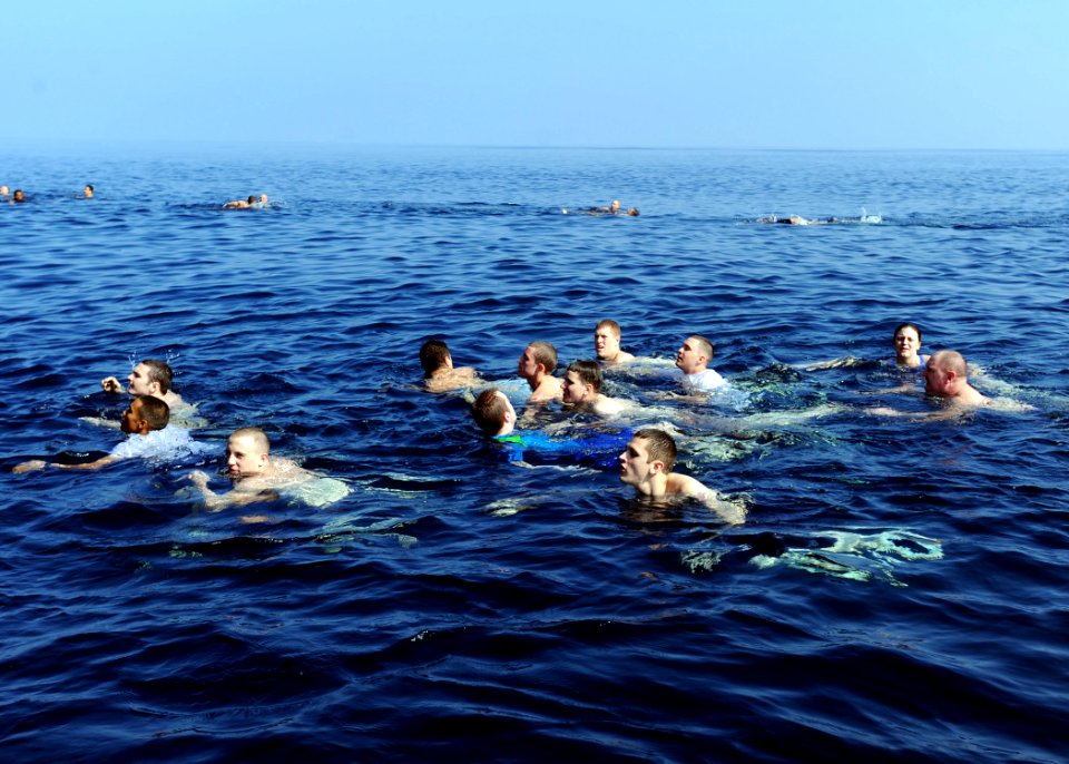 US Navy 090102-N-2908M-008 Sailors from the aircraft carrier USS Theodore Roosevelt (CVN 71) participate in a swim call