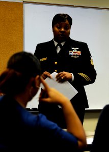 US Navy 090109-N-4515N-117 hief Aviation Electronics Technician Tinesha Cowart talks to military members and their spouses about being new parents