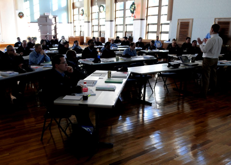 US Navy 090113-N-2638R-002 Prospective Volunteer Income Tax Assistance program participants listen to Internal Revenue Service tax consultant, Mr. Patrick Price