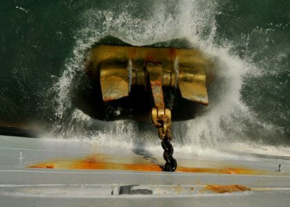 US Navy 110508-N-NL541-029 he two fluke balanced-fluke anchor aboard USS Thach (FFG 43) drops into the water as it anchors off the coast of Rio Gra