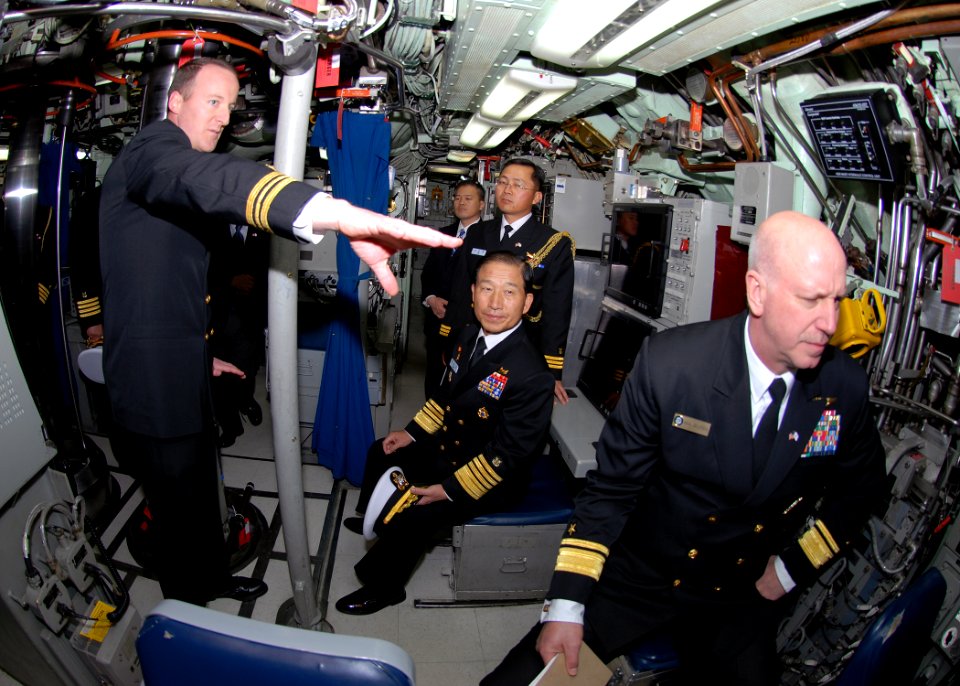 US Navy 090112-N-7705S-061 Lt. Cmdr Brad Terry, left, executive officer of the Los-Angeles class attack submarine USS Boise (SSN 764), explains control room operations to Republic of Korea Navy Chief of Naval Operations Adm. Ju
