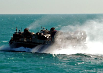 US Navy 090106-N-9134V-054 A landing craft air cushion disembarks from the amphibious dock landing ship USS Carter Hall (LSD 50)