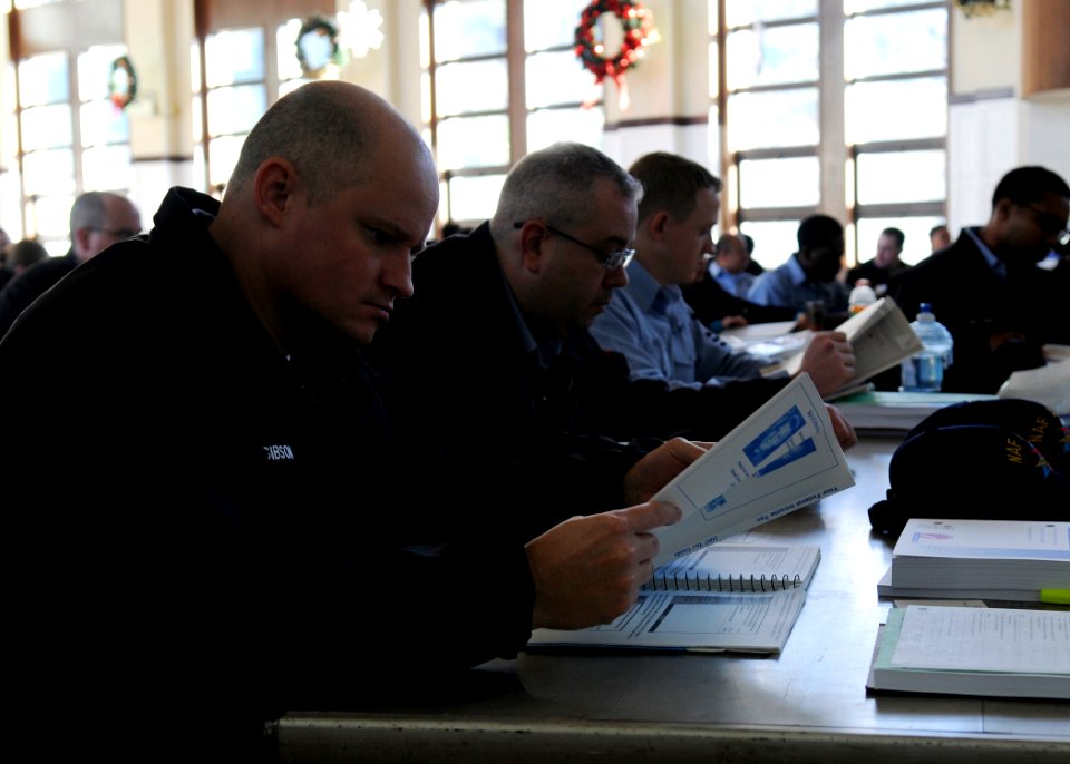 US Navy 090113-N-2638R-001 Culinary Specialist 1st Class Carey Gibson earns how to properly prepare taxes during training at Fleet Activities Yokosuka