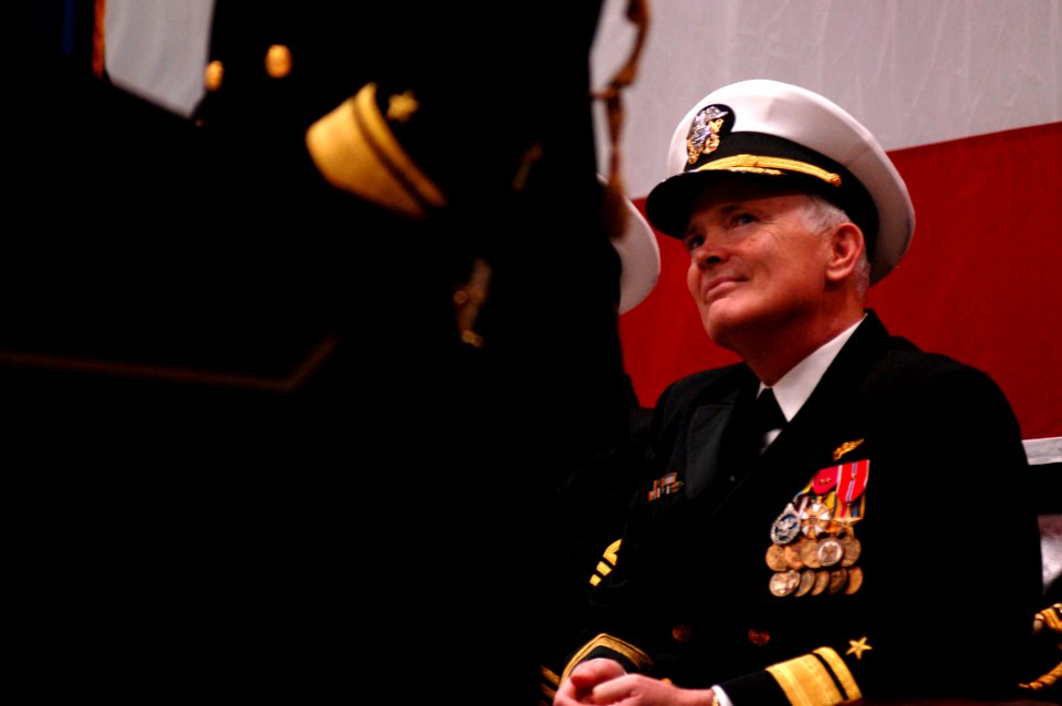 US Navy 090113-N-2984R-008 Rear Adm. Richard J. O'Hanlon looks on as Rear Adm.John W. Goodwin gives his final remarks and reading of orders during a change of command ceremony