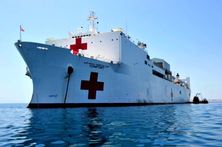 US Navy 110511-F-NJ219-131 USNS Comfort (T-AH 20) receives JP-5 jet fuel from a Peruvian barge before departing to Ecuador in support of Continuing