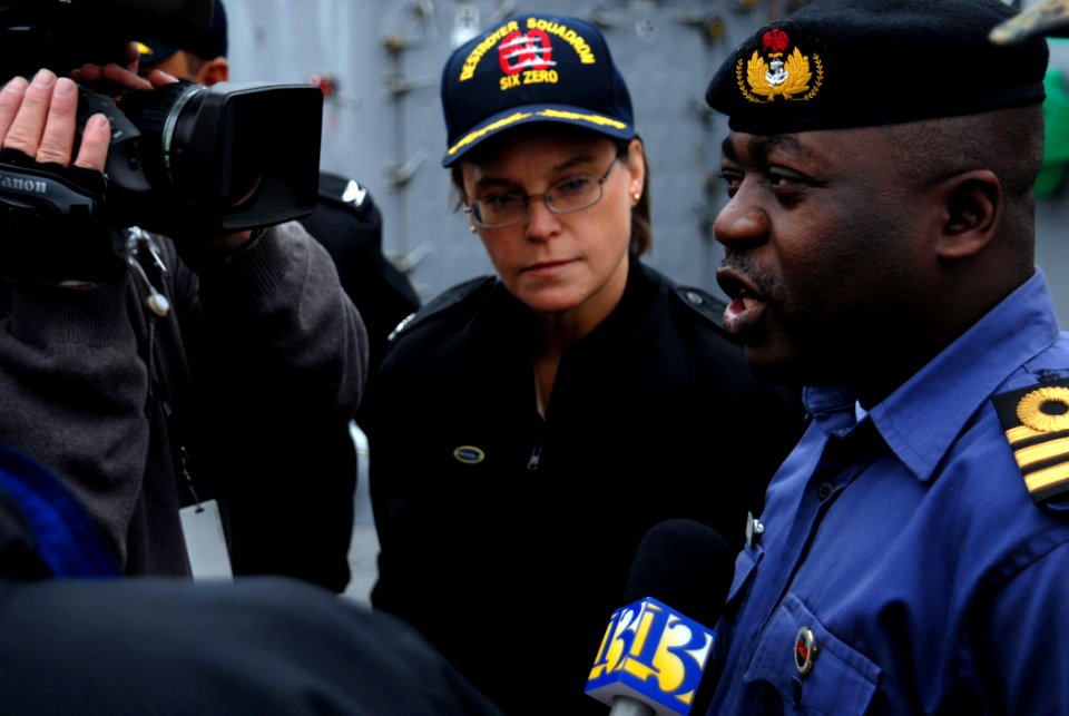 US Navy 090114-N-1688B-017 Cdr. Enoch Bello and Capt. Cynthia Thebaud speak with local media